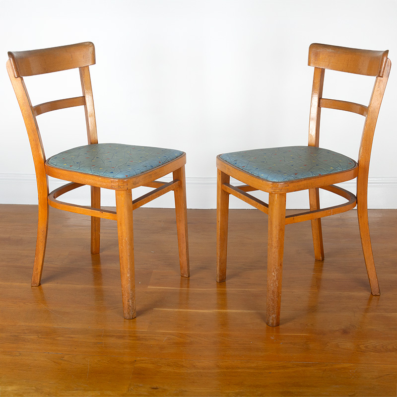 Pair of Mid-Century chairs fitted with the original geometric seat covers. (c.1970).